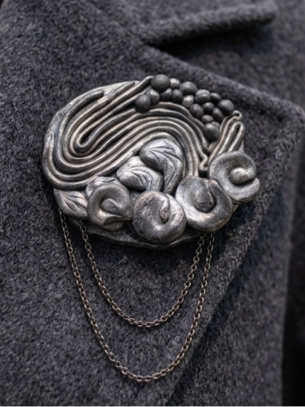 Elegant Black/Pewter Brooch with Chain Detail